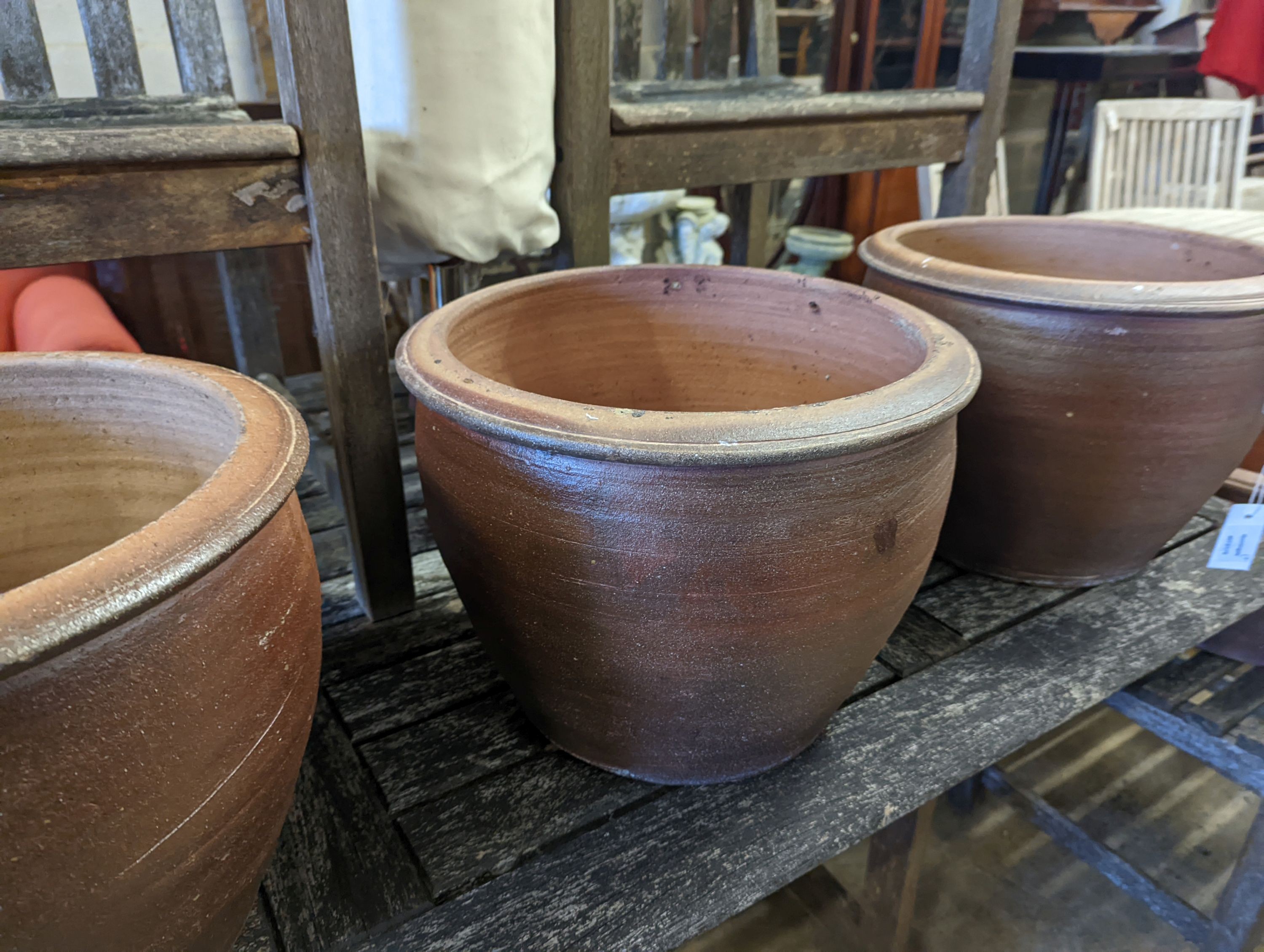 Four circular glazed earthenware garden planters, diameter 40cm, height 31cm